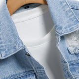 Men's light blue ripped denim jacket.