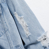 Men's light blue ripped denim jacket.