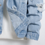 Men's light blue ripped denim jacket.